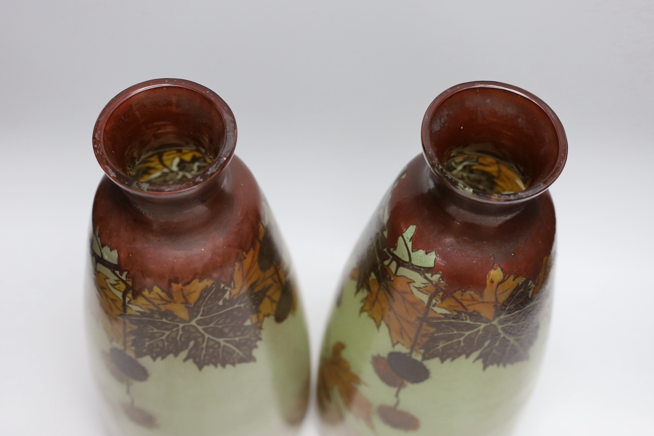 A large pair of French glass enamelled vases with autumnal design. 42cm tall